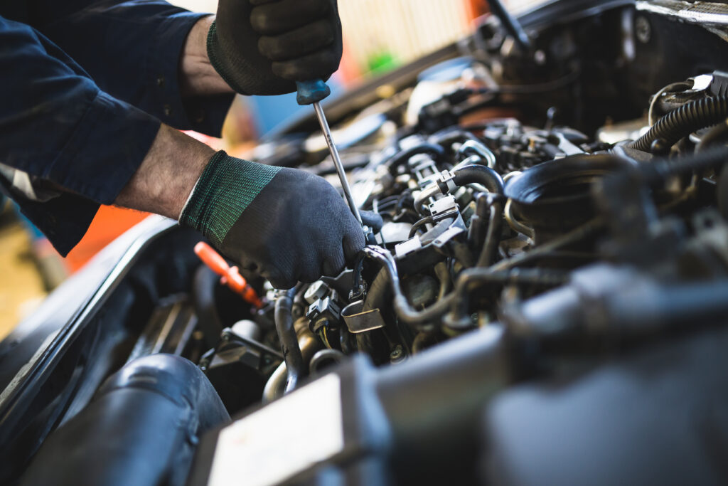 Person Working On a Car